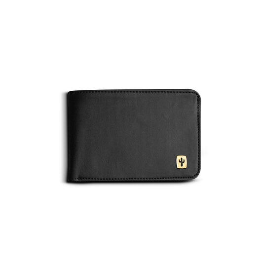 Vegan Leather wallet closed featuring brass label of a cactus