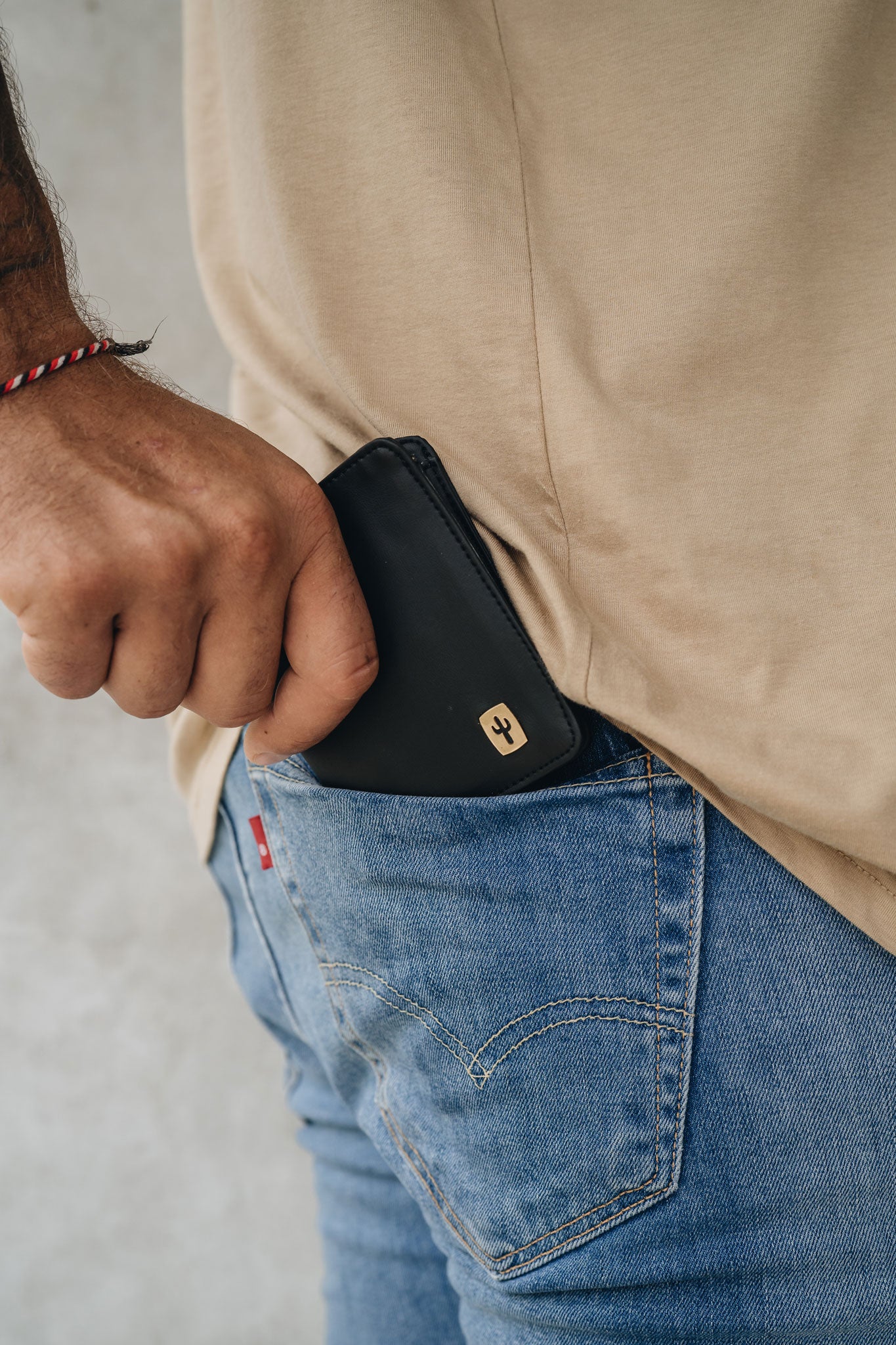 Slim zeppelin going into mens denim pocket