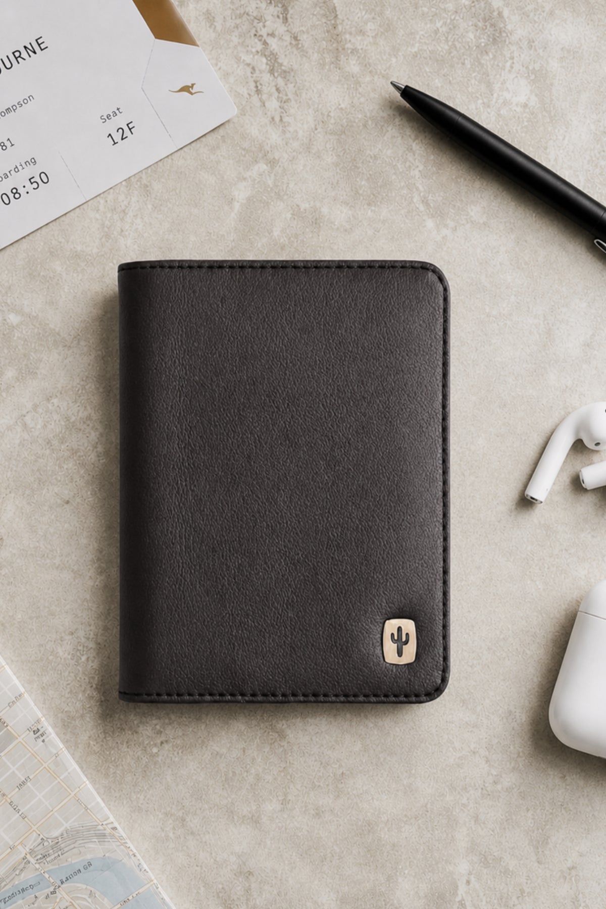 Vegan passport holder in black made from cactus leather, front view