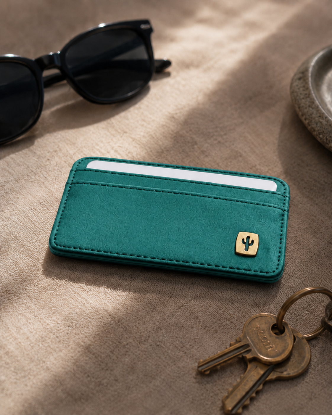 Vegan Womens card holder in teal made from cactus leather, in hand