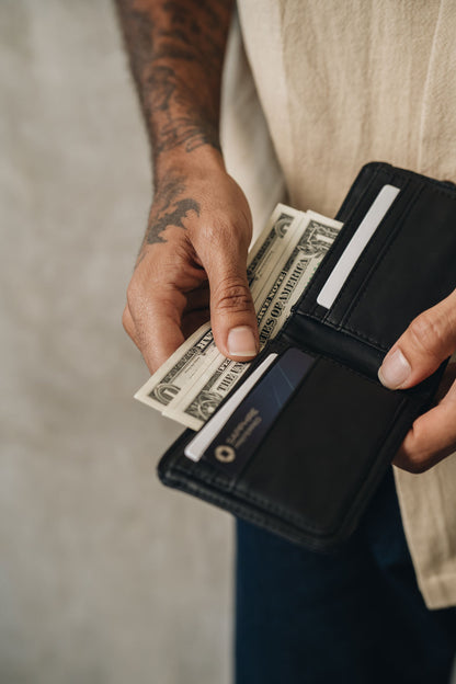 Cash & cards in the Hendrix Cactus Leather Wallet