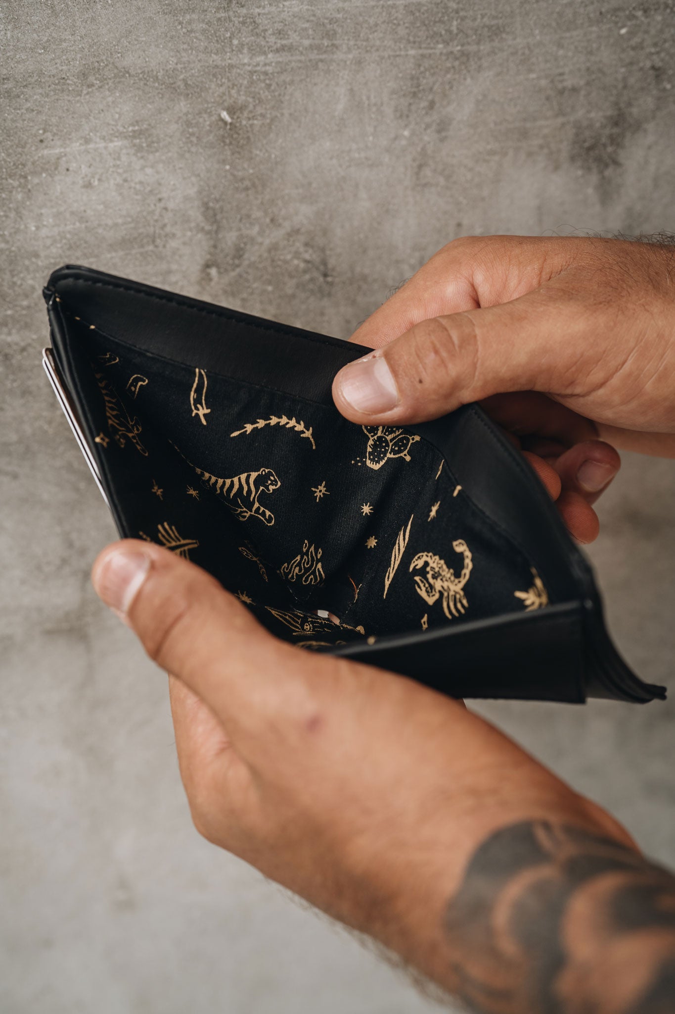 Internal lining is black with gold print in Cactus leather wallet